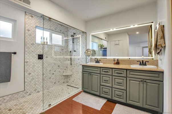 Bathroom, Dual Sink Vanities, Glass Shower, Interior, Recessed Lighting, Wood Texture Flooring