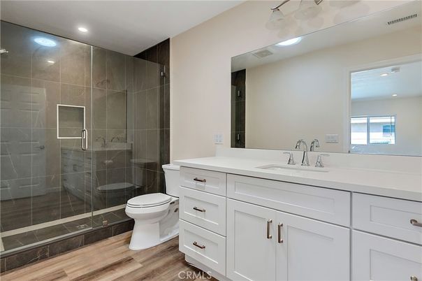 Bathroom, Glass Shower, Interior, Recessed Lighting, Wood Texture Flooring
