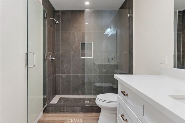 Bathroom, Glass Shower, Interior, Recessed Lighting, Wood Texture Flooring