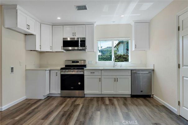 Interior, Kitchen, Recessed Lighting, Stainless Steel Appliances, Wood Texture Flooring
