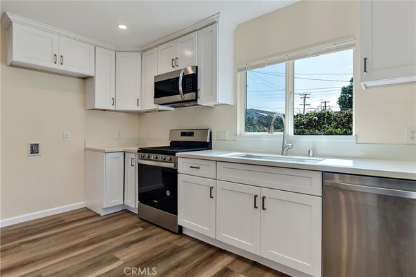 Interior, Kitchen, Recessed Lighting, Stainless Steel Appliances, Wood Texture Flooring