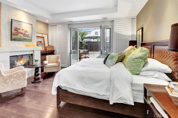 Bedroom, Fireplace, Interior, Recessed Lighting, Wood Texture Flooring
