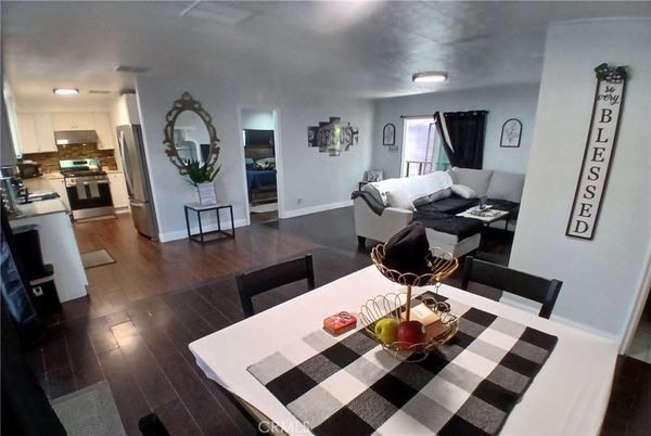 Dining room, Interior, Kitchen, Living room, Recessed Lighting, Stainless Steel Appliances, Wood Texture Flooring