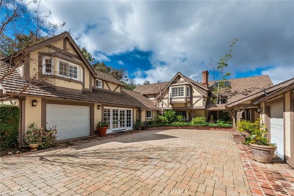 Attached, Exterior, Facade, Tudor Revival
