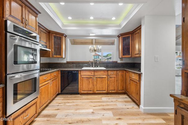 Chandelier, Interior, Kitchen, Recessed Lighting, Stainless Steel Appliances, Wood Texture Flooring