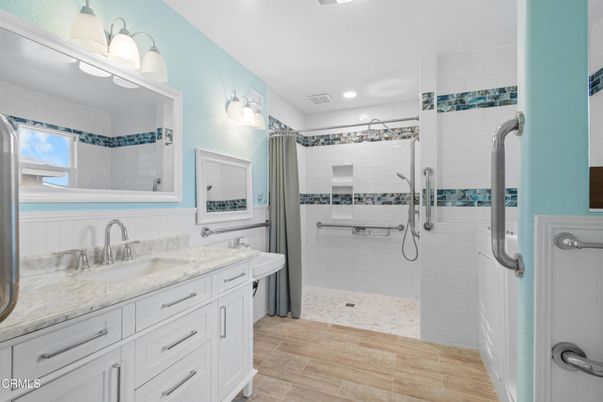 Bathroom, Dual Sink Vanities, Glass Shower, Interior, Recessed Lighting, Wood Texture Flooring