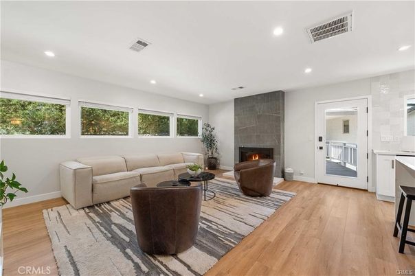 Fireplace, Interior, Living room, Recessed Lighting, Wood Texture Flooring