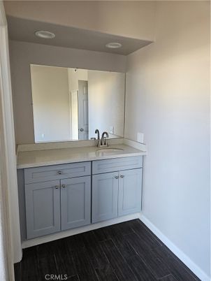 Bathroom, Dual Sink Vanities, Interior, Recessed Lighting, Wood Texture Flooring