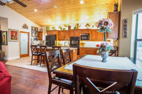 Dining room, Interior, Kitchen, Recessed Lighting, Stainless Steel Appliances, Wooden Ceilings, Wood Texture Flooring