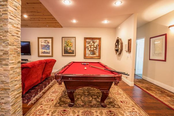 Billiard Table, Game Room, Interior, Recessed Lighting, Stone Walls, Wood Texture Flooring