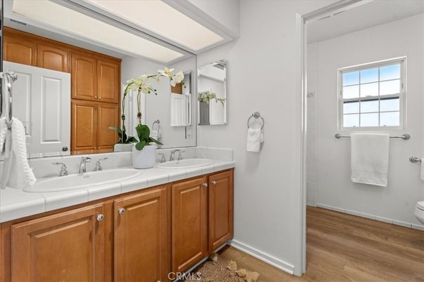 Bathroom, Dual Sink Vanities, Interior, Tile Countertops, Wood Texture Flooring