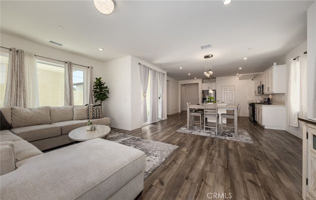 Chandelier, Dining room, Interior, Kitchen, Living room, Pendant Lights, Recessed Lighting, Wood Texture Flooring