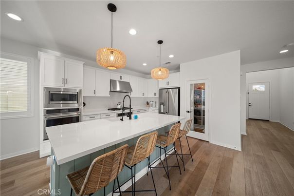 Interior, Kitchen, Pendant Lights, Recessed Lighting, Stainless Steel Appliances, Wood Texture Flooring