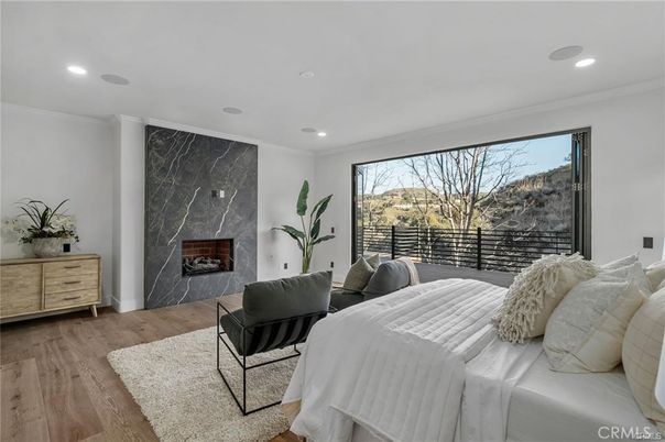Bedroom, Fireplace, Interior, Marble Walls, Recessed Lighting, Wood Texture Flooring