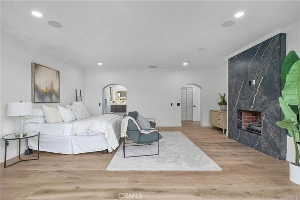 Bedroom, Fireplace, Interior, Living room, Marble Walls, Recessed Lighting, Wood Texture Flooring