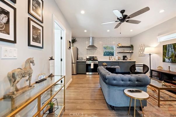 Interior, Kitchen, Living room, Recessed Lighting, Stainless Steel Appliances, Stone Walls, Wood Texture Flooring