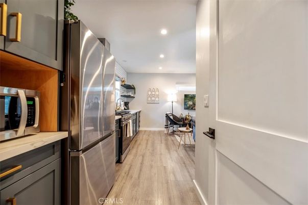 Interior, Kitchen, Recessed Lighting, Stainless Steel Appliances, Wood Texture Flooring