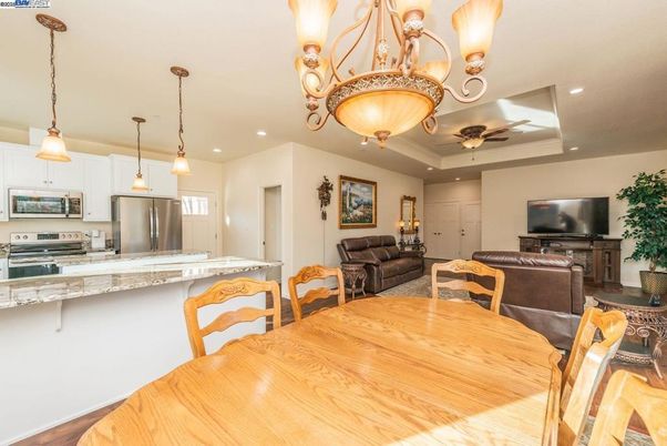 Dining room, Interior, Kitchen, Pendant Lights, Recessed Lighting, Stainless Steel Appliances, Wood Texture Flooring