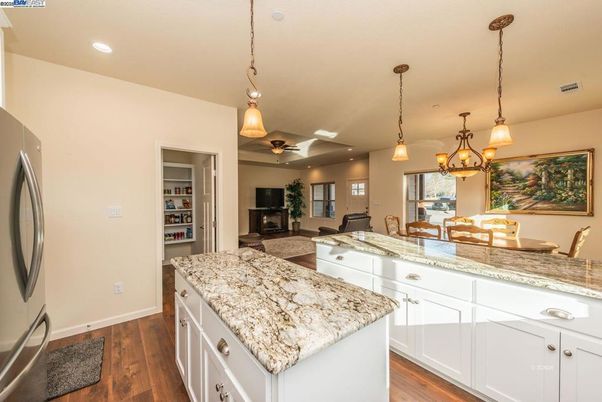 Dining room, Fireplace, Interior, Kitchen, Living room, Pendant Lights, Recessed Lighting, Wood Texture Flooring