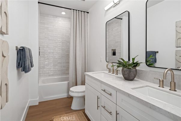 Bathroom, Dual Sink Vanities, Interior, Recessed Lighting, Wood Texture Flooring