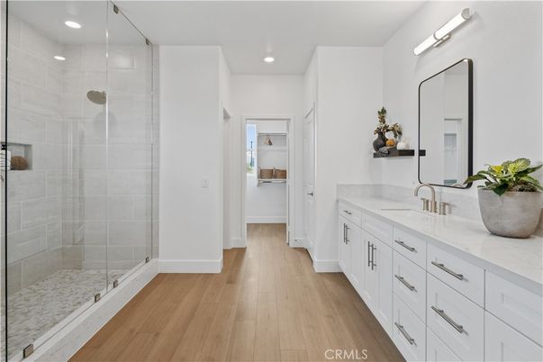 Bathroom, Dual Sink Vanities, Glass Shower, Interior, Recessed Lighting, Wood Texture Flooring