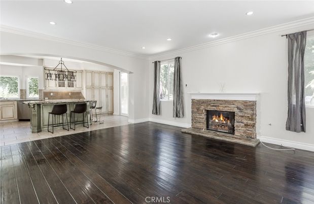 Empty room, Fireplace, Interior, Kitchen, Recessed Lighting, Wood Texture Flooring