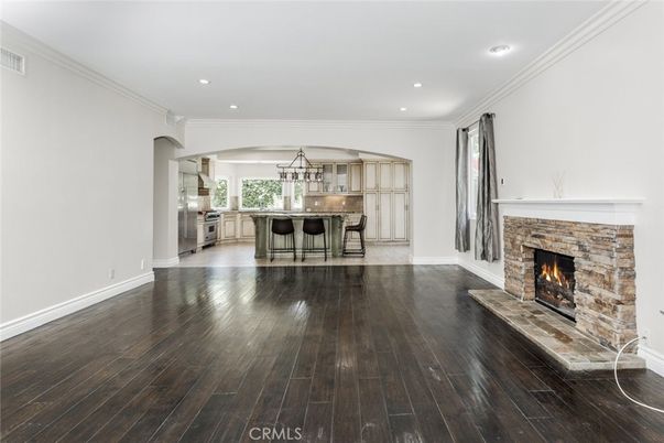 Empty room, Fireplace, Interior, Kitchen, Recessed Lighting, Wood Texture Flooring