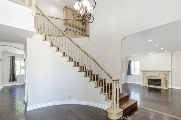Chandelier, Fireplace, Interior, Recessed Lighting, Wood Texture Flooring