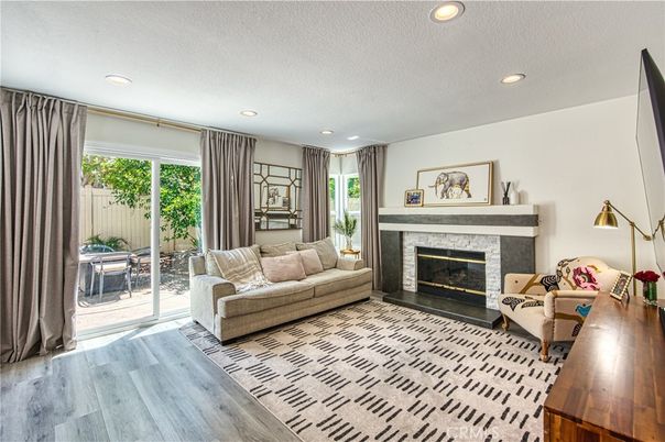 Fireplace, Interior, Living room, Recessed Lighting, Wood Texture Flooring