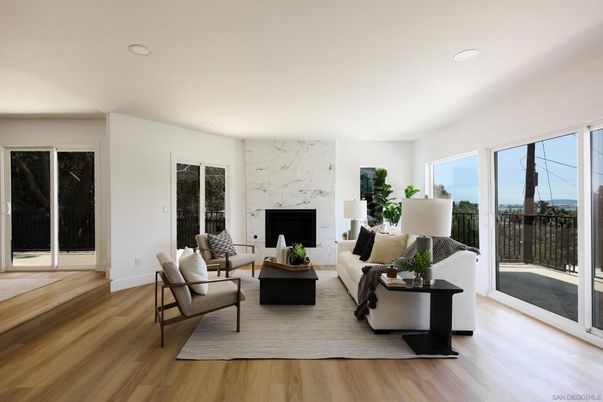 Fireplace, Interior, Living room, Marble Walls, Recessed Lighting, Wood Texture Flooring