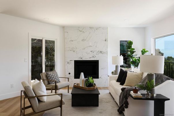 Fireplace, Interior, Living room, Marble Walls, Recessed Lighting, Wood Texture Flooring