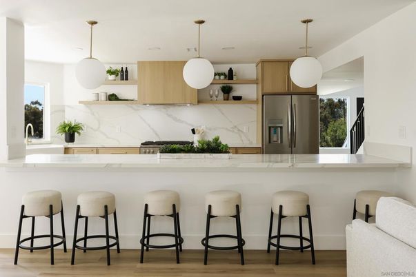 Interior, Kitchen, Marble Walls, Pendant Lights, Stainless Steel Appliances, Wood Texture Flooring