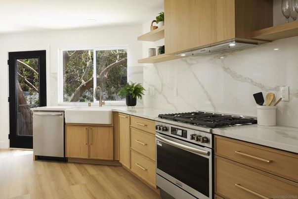 Interior, Kitchen, Marble Walls, Recessed Lighting, Stainless Steel Appliances, Wood Texture Flooring