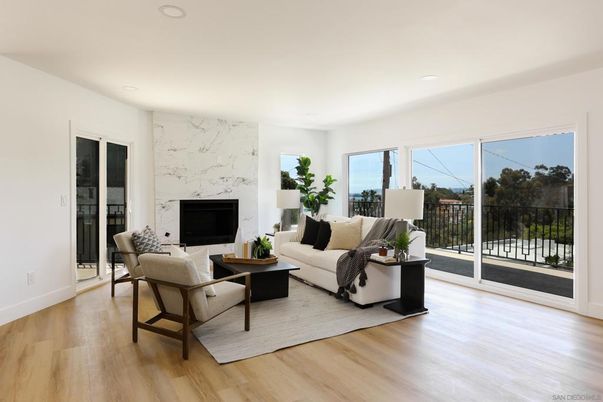 Fireplace, Interior, Living room, Marble Walls, Recessed Lighting, Wood Texture Flooring