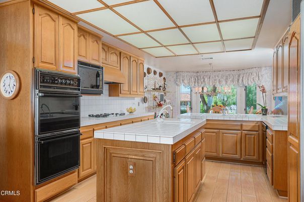 Interior, Kitchen, Tile Countertops, Wood Texture Flooring