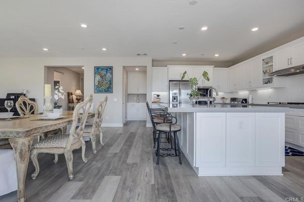 Dining room, Interior, Kitchen, Recessed Lighting, Stainless Steel Appliances, Wood Texture Flooring