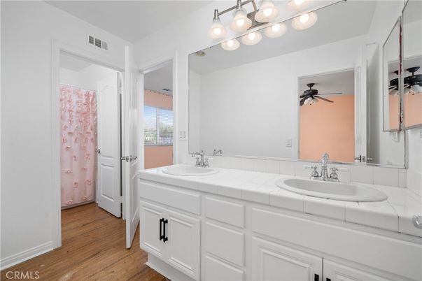 Bathroom, Dual Sink Vanities, Interior, Tile Countertops, Wood Texture Flooring