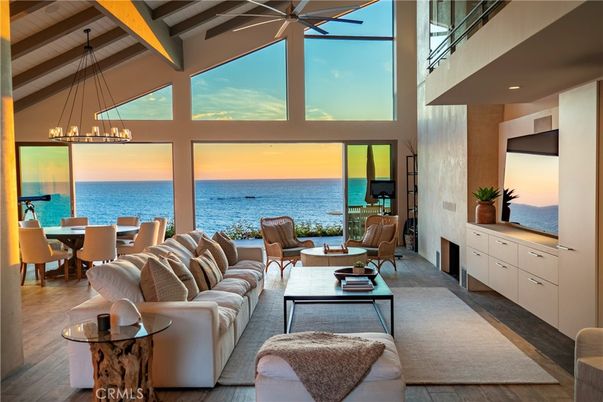 Dining room, Fireplace, Interior, Living room, Pendant Lights, Water, Wooden Beams, Wooden Ceilings, Wood Texture Flooring
