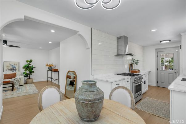 Dining room, Interior, Kitchen, Recessed Lighting, Stainless Steel Appliances, Wood Texture Flooring