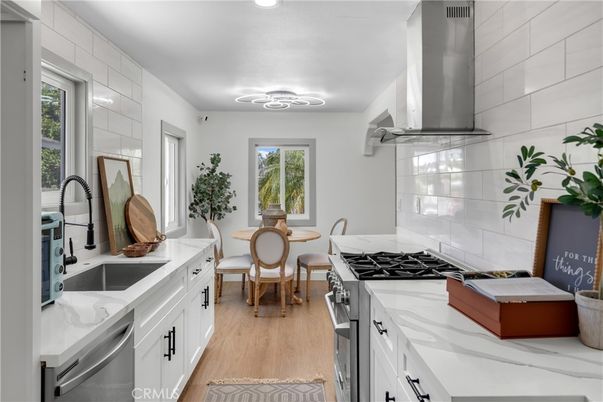 Dining room, Interior, Kitchen, Recessed Lighting, Stainless Steel Appliances, Wood Texture Flooring