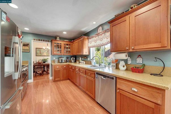 Dining room, Interior, Kitchen, Recessed Lighting, Stainless Steel Appliances, Wood Texture Flooring