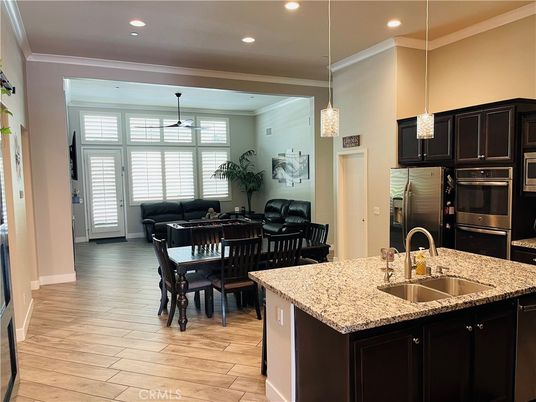 Dining room, Interior, Kitchen, Pendant Lights, Recessed Lighting, Stainless Steel Appliances, Wood Texture Flooring