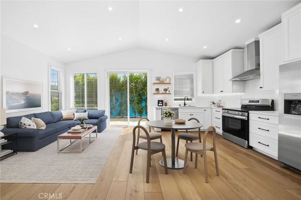 Dining room, Interior, Kitchen, Living room, Recessed Lighting, Stainless Steel Appliances, Wood Texture Flooring