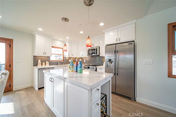 Interior, Kitchen, Pendant Lights, Recessed Lighting, Stainless Steel Appliances, Wood Texture Flooring