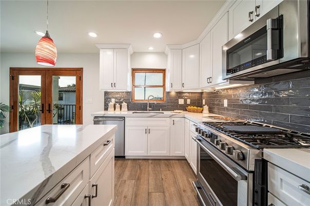 Interior, Kitchen, Pendant Lights, Recessed Lighting, Stainless Steel Appliances, Wood Texture Flooring