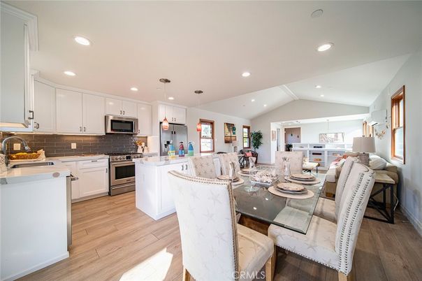 Dining room, Interior, Kitchen, Pendant Lights, Recessed Lighting, Stainless Steel Appliances, Wood Texture Flooring