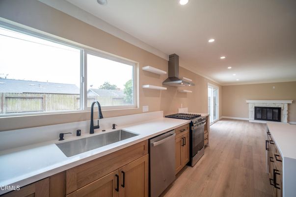 Fireplace, Interior, Kitchen, Recessed Lighting, Wood Texture Flooring