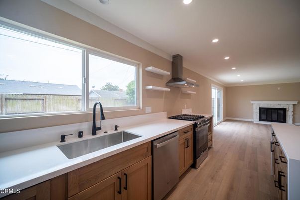 Fireplace, Interior, Kitchen, Recessed Lighting, Wood Texture Flooring