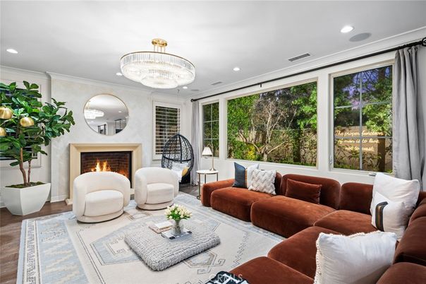 Chandelier, Fireplace, Interior, Living room, Recessed Lighting, Wood Texture Flooring