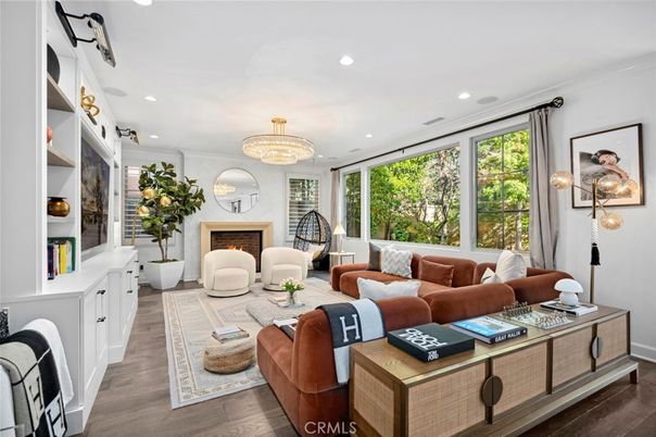 Chandelier, Fireplace, Interior, Living room, Recessed Lighting, Wood Texture Flooring